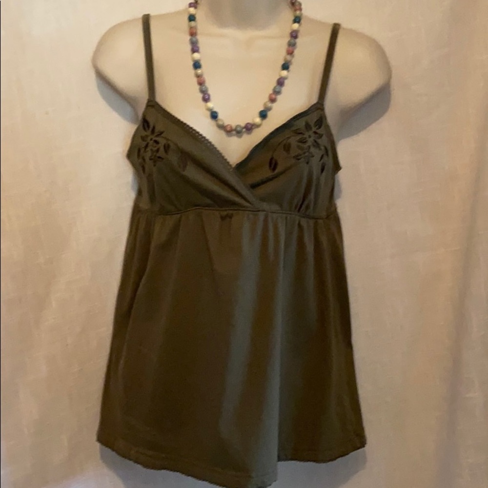 Ladies top.  Embroidered flowers enhance front